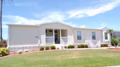 This amazing 4-bedroom, 3-bathroom Palm Harbor home is a gem on Schalamar Creek Golf and Country Club in Florida - for sale on GolfHomes.com, golf home, golf lot