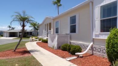 This amazing 4-bedroom, 3-bathroom Palm Harbor home is a gem on Schalamar Creek Golf and Country Club in Florida - for sale on GolfHomes.com, golf home, golf lot