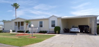 This amazing 4-bedroom, 3-bathroom Palm Harbor home is a gem on Schalamar Creek Golf and Country Club in Florida - for sale on GolfHomes.com, golf home, golf lot