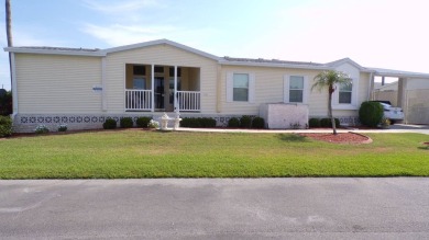 This amazing 4-bedroom, 3-bathroom Palm Harbor home is a gem on Schalamar Creek Golf and Country Club in Florida - for sale on GolfHomes.com, golf home, golf lot