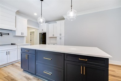 Come See this Beautiful New Construction by Merit Homes in on Sapelo Hammock Golf Club in Georgia - for sale on GolfHomes.com, golf home, golf lot