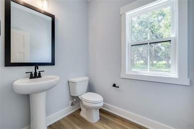 Come See this Beautiful New Construction by Merit Homes in on Sapelo Hammock Golf Club in Georgia - for sale on GolfHomes.com, golf home, golf lot