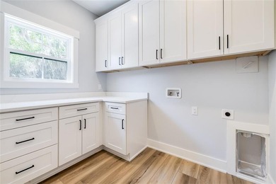 Come See this Beautiful New Construction by Merit Homes in on Sapelo Hammock Golf Club in Georgia - for sale on GolfHomes.com, golf home, golf lot