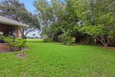 Nice family home on a corner lot that backs up to the golf on Island Pines Golf Club in Florida - for sale on GolfHomes.com, golf home, golf lot