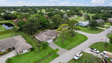 Nice family home on a corner lot that backs up to the golf on Island Pines Golf Club in Florida - for sale on GolfHomes.com, golf home, golf lot