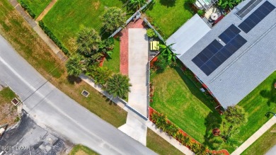 Coastal Living Just Steps from the Beach -
Open-concept on Oceanside Country Club in Florida - for sale on GolfHomes.com, golf home, golf lot