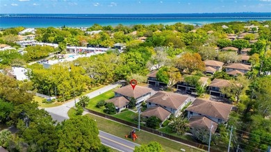 Turn-key and move-in ready! Welcome to this bright 2-bedroom, 1 on Cove Cay Country Club in Florida - for sale on GolfHomes.com, golf home, golf lot