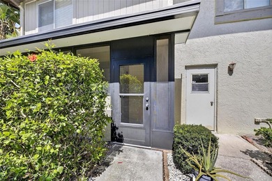 Turn-key and move-in ready! Welcome to this bright 2-bedroom, 1 on Cove Cay Country Club in Florida - for sale on GolfHomes.com, golf home, golf lot