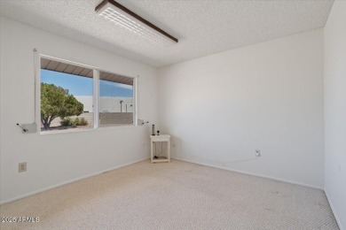 Welcome to this delightful 3-bedroom, 2-bathroom home in Sun on Sun City Country Club in Arizona - for sale on GolfHomes.com, golf home, golf lot
