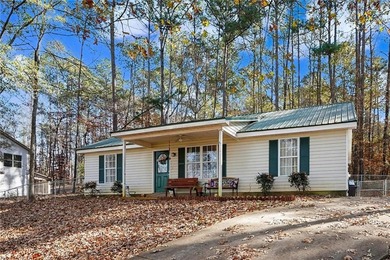 2.8% Assumable FHA with Roam! Welcome home to this charming on Turtle Cove Golf Course in Georgia - for sale on GolfHomes.com, golf home, golf lot