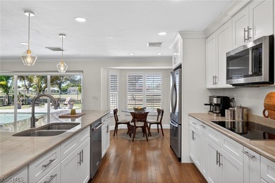 Beautiful 3 Bedroom, 2 Bath Plus a Den, POOL HOME with a GOLF on Whiskey Creek Country Club in Florida - for sale on GolfHomes.com, golf home, golf lot