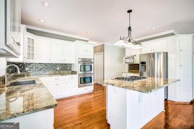 Welcome to your dream home, perfectly situated on a stunning on Canongate On White Oak Golf Course in Georgia - for sale on GolfHomes.com, golf home, golf lot