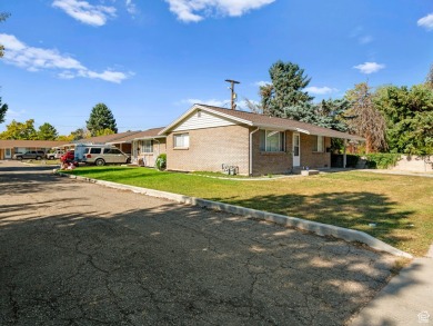 Three Side by Side brick duplexes, totaling 6 units on .50 acres on Nibley Park Golf Course in Utah - for sale on GolfHomes.com, golf home, golf lot