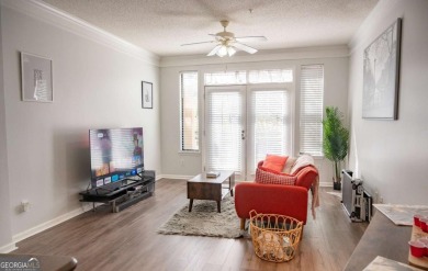 Ground floor with private patio and open view, Welcome to your on Art Foundry in Atlantic Station Golf Course in Georgia - for sale on GolfHomes.com, golf home, golf lot