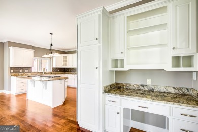Welcome to your dream home, perfectly situated on a stunning on Canongate On White Oak Golf Course in Georgia - for sale on GolfHomes.com, golf home, golf lot