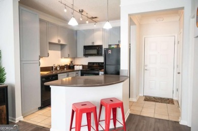 Ground floor with private patio and open view, Welcome to your on Art Foundry in Atlantic Station Golf Course in Georgia - for sale on GolfHomes.com, golf home, golf lot