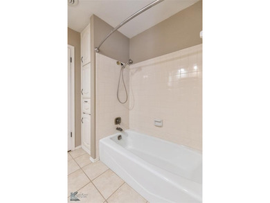 Welcome to this beautifully updated, charming 3-bedroom, 3-bath on Abilene Country Club - South Course in Texas - for sale on GolfHomes.com, golf home, golf lot