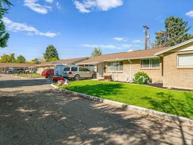 Three Side by Side brick duplexes, totaling 6 units on .50 acres on Nibley Park Golf Course in Utah - for sale on GolfHomes.com, golf home, golf lot