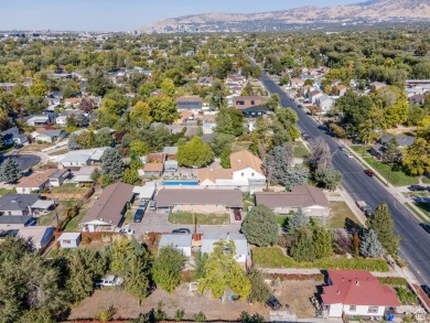 Three Side by Side brick duplexes, totaling 6 units on .50 acres on Nibley Park Golf Course in Utah - for sale on GolfHomes.com, golf home, golf lot