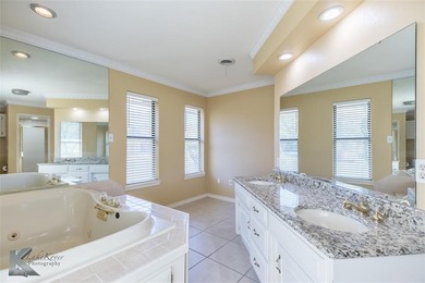 Welcome to this beautifully updated, charming 3-bedroom, 3-bath on Abilene Country Club - South Course in Texas - for sale on GolfHomes.com, golf home, golf lot