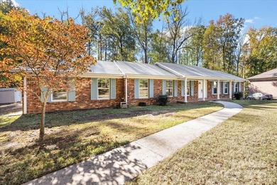 Welcome to 1840 Stoneyridge Drive, solid brick ranch home in on Pine Island Country Club in North Carolina - for sale on GolfHomes.com, golf home, golf lot