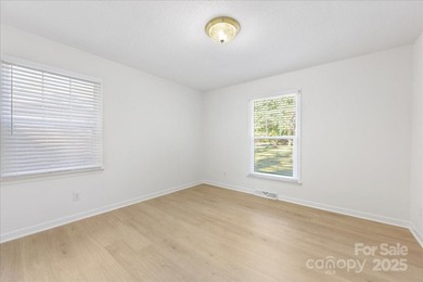 Welcome to 1840 Stoneyridge Drive, solid brick ranch home in on Pine Island Country Club in North Carolina - for sale on GolfHomes.com, golf home, golf lot