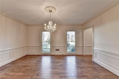 Nestled on a quiet cul-de-sac street just steps from the on Country Club of Roswell in Georgia - for sale on GolfHomes.com, golf home, golf lot