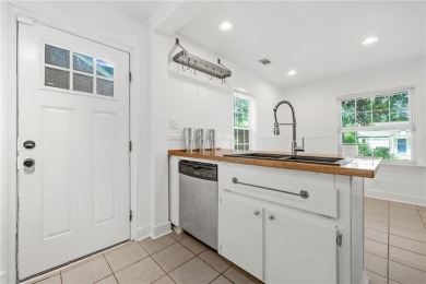 Your Decatur Dream Home awaits! This 1,300 sq ft bungalow is on East Lake Golf Club in Georgia - for sale on GolfHomes.com, golf home, golf lot