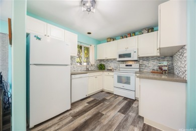Welcome to your meticulously maintained retreat in lush Launani on Leilehua Golf Course in Hawaii - for sale on GolfHomes.com, golf home, golf lot