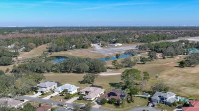 A meticulous 3 bedroom, 2 bath with an attached 2 car garage on Spruce Creek Golf Club in Florida - for sale on GolfHomes.com, golf home, golf lot