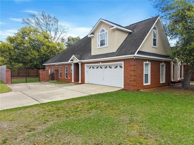 Custom-built home in the established Llanfair subdivision on Spring Hill College Golf Course in Alabama - for sale on GolfHomes.com, golf home, golf lot