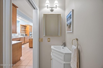 Discover refined coastal living in this exceptional Bosher's on Sound Golf Links at Albemarle Plantation in North Carolina - for sale on GolfHomes.com, golf home, golf lot