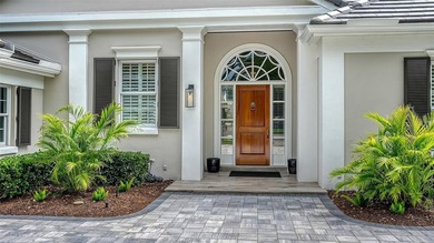 Experience the charm of this original Bo MacEwen-designed home on The Oaks Club in Florida - for sale on GolfHomes.com, golf home, golf lot