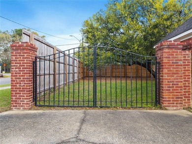 Custom-built home in the established Llanfair subdivision on Spring Hill College Golf Course in Alabama - for sale on GolfHomes.com, golf home, golf lot