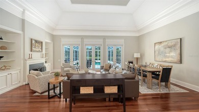 Experience the charm of this original Bo MacEwen-designed home on The Oaks Club in Florida - for sale on GolfHomes.com, golf home, golf lot