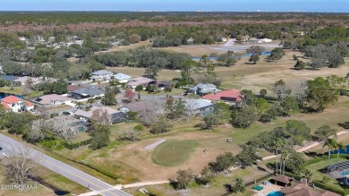 A meticulous 3 bedroom, 2 bath with an attached 2 car garage on Spruce Creek Golf Club in Florida - for sale on GolfHomes.com, golf home, golf lot