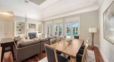 Experience the charm of this original Bo MacEwen-designed home on The Oaks Club in Florida - for sale on GolfHomes.com, golf home, golf lot