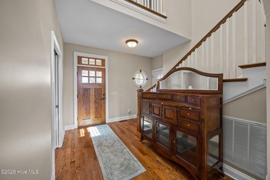 Discover refined coastal living in this exceptional Bosher's on Sound Golf Links at Albemarle Plantation in North Carolina - for sale on GolfHomes.com, golf home, golf lot