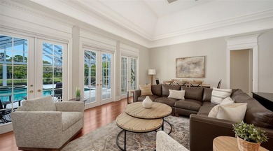 Experience the charm of this original Bo MacEwen-designed home on The Oaks Club in Florida - for sale on GolfHomes.com, golf home, golf lot