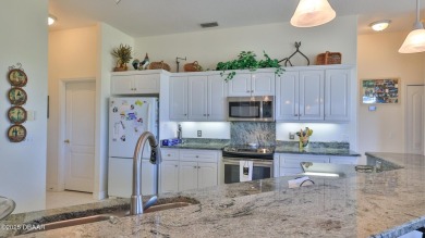A meticulous 3 bedroom, 2 bath with an attached 2 car garage on Spruce Creek Golf Club in Florida - for sale on GolfHomes.com, golf home, golf lot