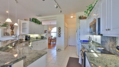 A meticulous 3 bedroom, 2 bath with an attached 2 car garage on Spruce Creek Golf Club in Florida - for sale on GolfHomes.com, golf home, golf lot