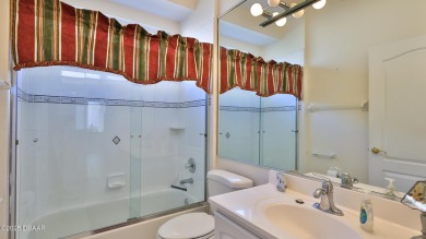 A meticulous 3 bedroom, 2 bath with an attached 2 car garage on Spruce Creek Golf Club in Florida - for sale on GolfHomes.com, golf home, golf lot