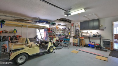 A meticulous 3 bedroom, 2 bath with an attached 2 car garage on Spruce Creek Golf Club in Florida - for sale on GolfHomes.com, golf home, golf lot