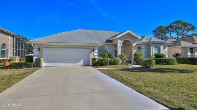 A meticulous 3 bedroom, 2 bath with an attached 2 car garage on Spruce Creek Golf Club in Florida - for sale on GolfHomes.com, golf home, golf lot