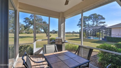 A meticulous 3 bedroom, 2 bath with an attached 2 car garage on Spruce Creek Golf Club in Florida - for sale on GolfHomes.com, golf home, golf lot