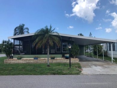 This home is on leased land with monthly lot rent of $894.32 on Rolling Green Golf Course in Florida - for sale on GolfHomes.com, golf home, golf lot