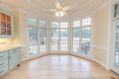 Golf-front living at its best in the gated community of Carolina on Carolina Trace Country Club in North Carolina - for sale on GolfHomes.com, golf home, golf lot