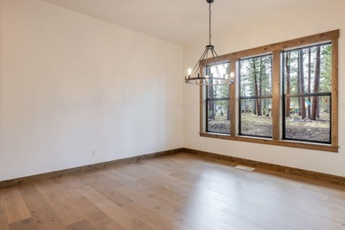 Overlooking the tranquil setting of Preservation Park, this on Sunriver Caldera Springs Golf Course in Oregon - for sale on GolfHomes.com, golf home, golf lot