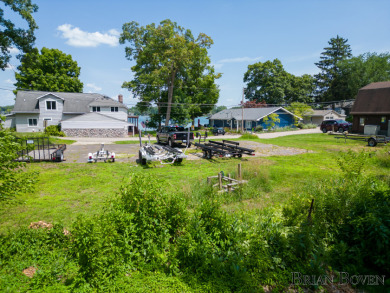 Hard to find 120ft of sandy private frontage on highly desirable on Silver Lake Country Club in Michigan - for sale on GolfHomes.com, golf home, golf lot