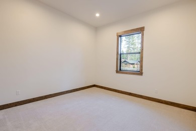 Overlooking the tranquil setting of Preservation Park, this on Sunriver Caldera Springs Golf Course in Oregon - for sale on GolfHomes.com, golf home, golf lot